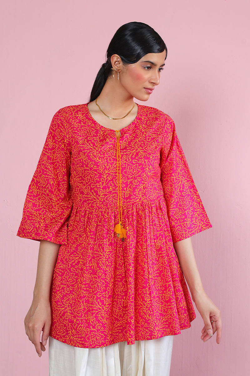 Sherbet Peplum Top